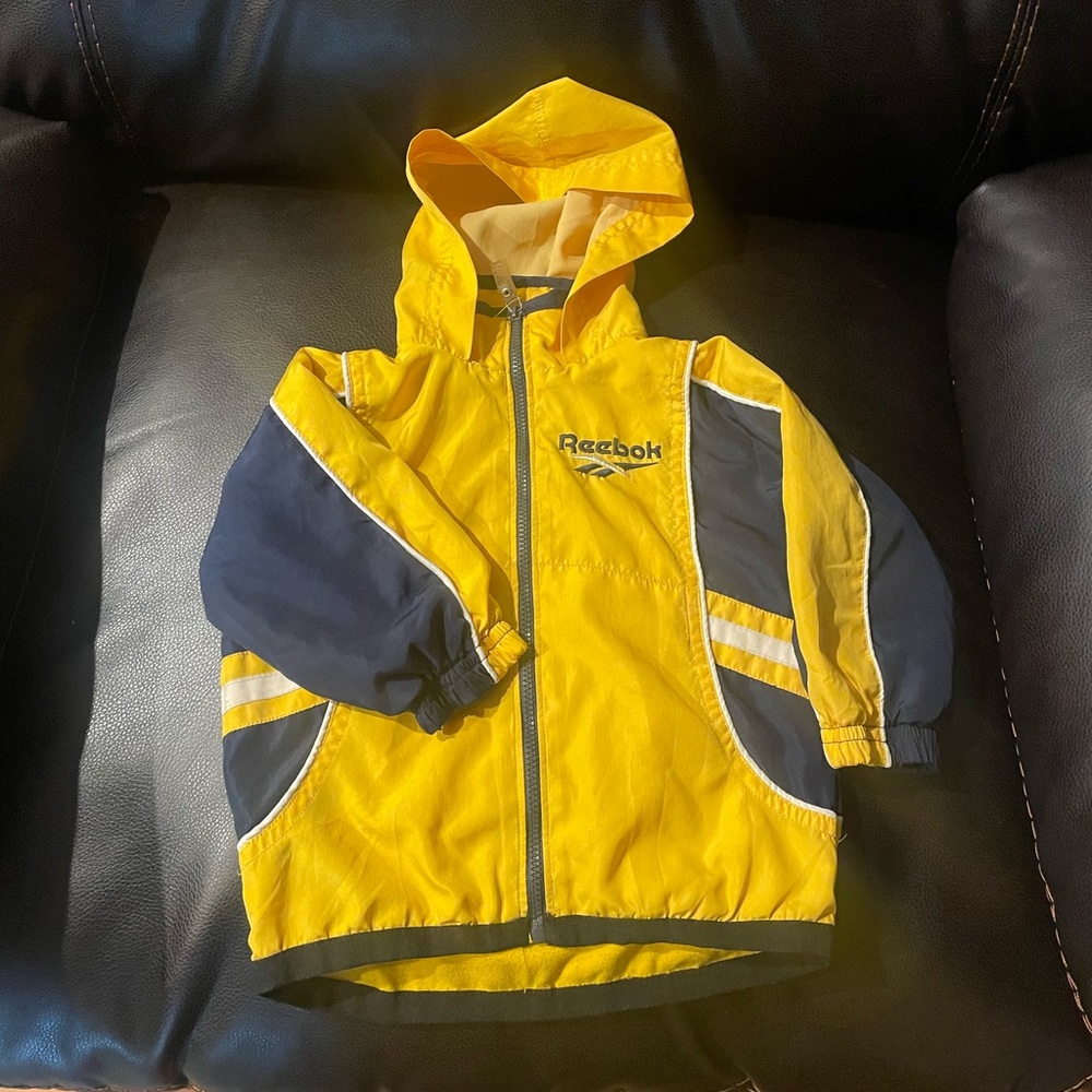 🔴 Reebok. Boys 18 months yellow rain jacket. Nice condition